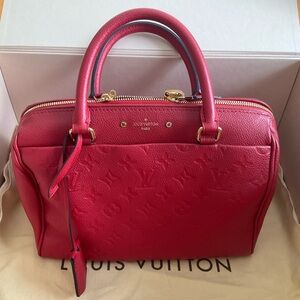 LOUIS VUITTON
Monogram Empreinte Speedy 25 Bandouliere